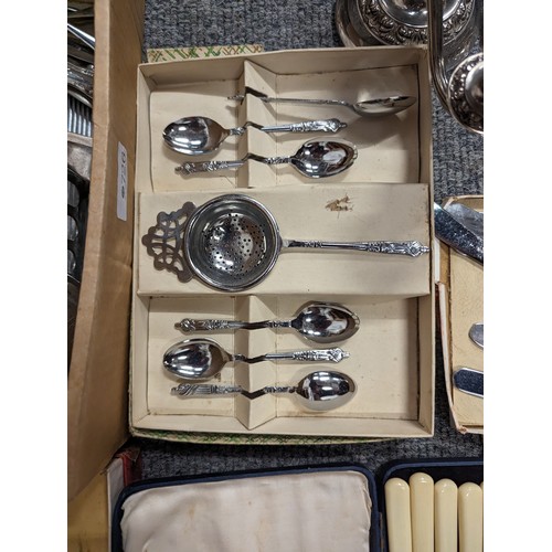 726 - Box of mostly silver plated items including flatware with some stainless items.