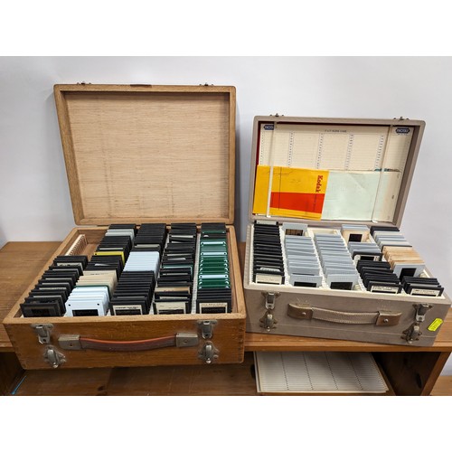 724 - two cases of vintage slides. Mixed including landmarks.