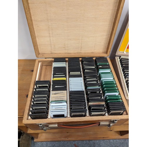 724 - two cases of vintage slides. Mixed including landmarks.