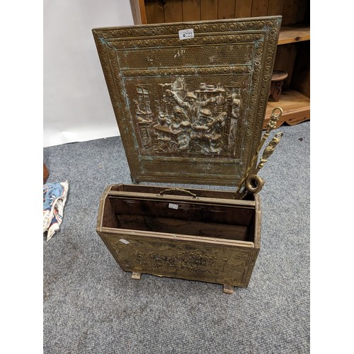 722 - Pressed brass covered fire screen and magazine rack. With forks and snuffer.