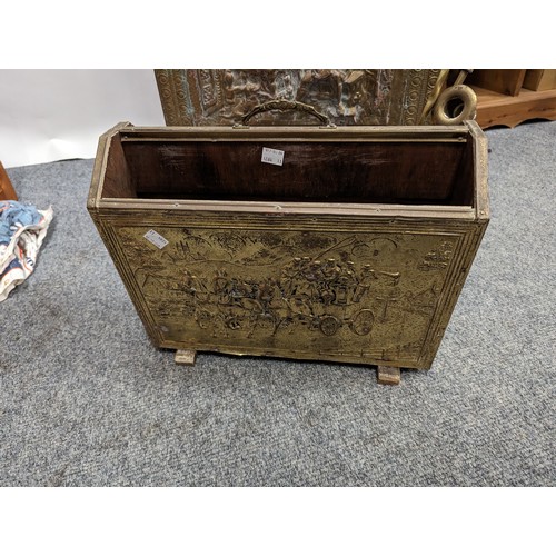 722 - Pressed brass covered fire screen and magazine rack. With forks and snuffer.