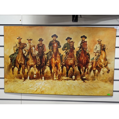 742 - Large print of The magnificent seven by Renato Casaro approx 100 x 61cm 