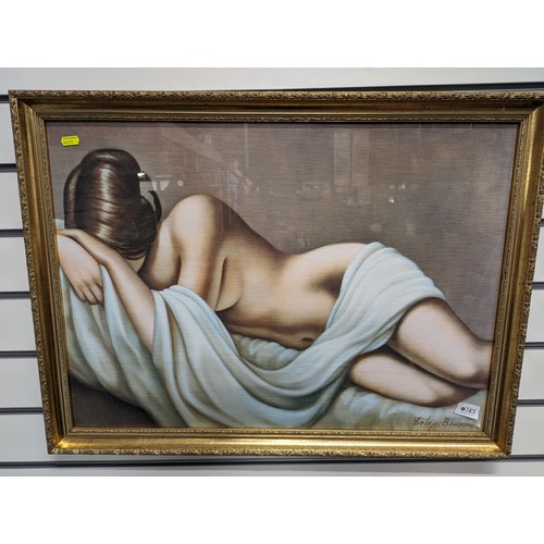 743 - Girl laying print signed lower right 76 x 56cm