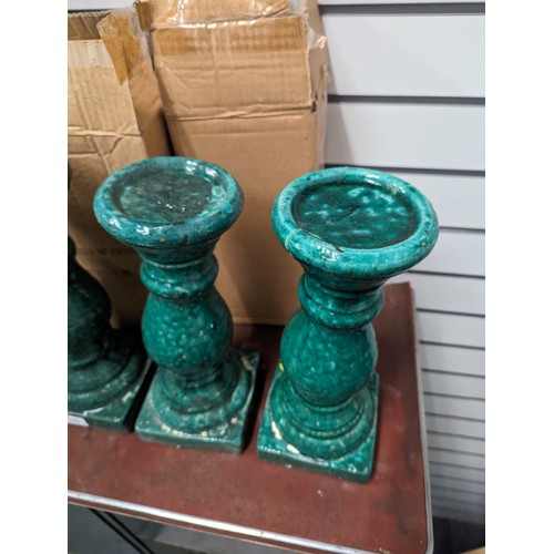 745 - 6 x green glazed ceramic candle holders Approx H32cm  