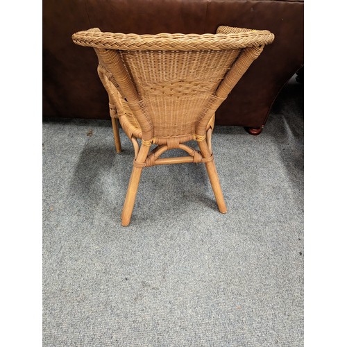 708 - Wicker tub chair. Height at back. 73cm