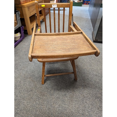 712 - Vintage childs chair with flip over table.