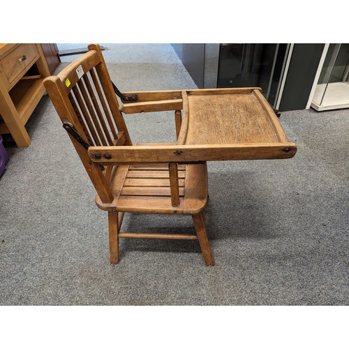 712 - Vintage childs chair with flip over table.