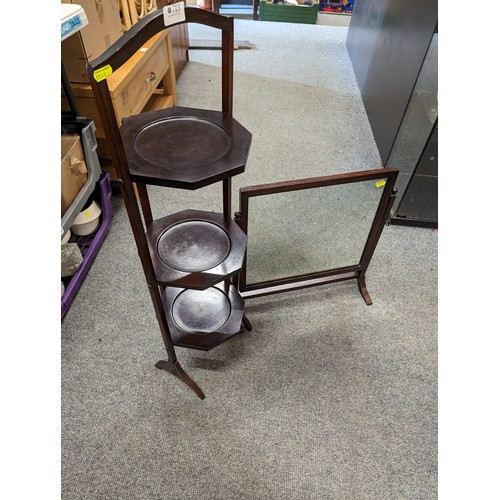 713 - Mahogany foldable 3 tier cake stand with a table top swing mirror. 