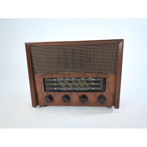 24 - A 1950s Banner B55 valve radio receiver. Not sold in working order, untested with no plug.