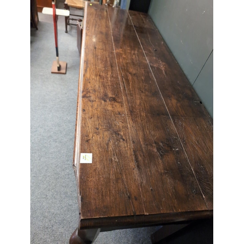 33 - An early c19 oak dresser base/sideboard. W182cm D60cm H90cm