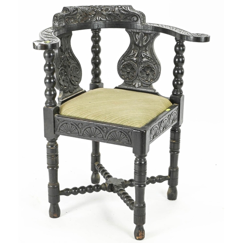 57 - Carved oak corner chair 42 cm by 81 cm