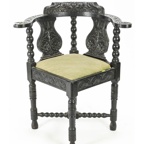 57 - Carved oak corner chair 42 cm by 81 cm