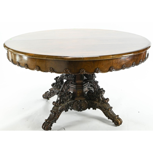 65 - Late C19 rosewood topped table. Sat on carved detail pedestal base, raised on castors. Diam130cm H77... 