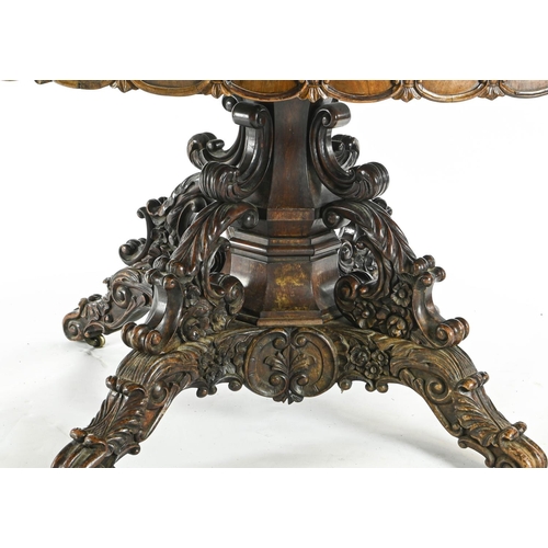 65 - Late C19 rosewood topped table. Sat on carved detail pedestal base, raised on castors. Diam130cm H77... 