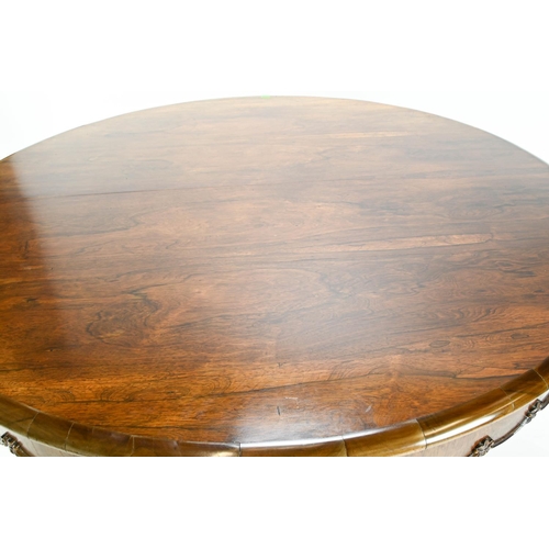 65 - Late C19 rosewood topped table. Sat on carved detail pedestal base, raised on castors. Diam130cm H77... 