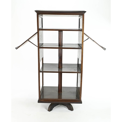 67 - Revolving bookcase,/ sheet music 60cm by 49cm by 132cm