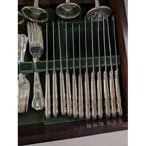 102 - Leather topped canteen table containing Butler of Sheffield silver plated six serving cutlery, goble... 