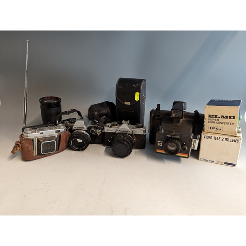 170 - Olympus om10, Fujica stx-1, Polaroid, Retina, Casio LCD TV portable, Elmo super zoom converter, vide... 