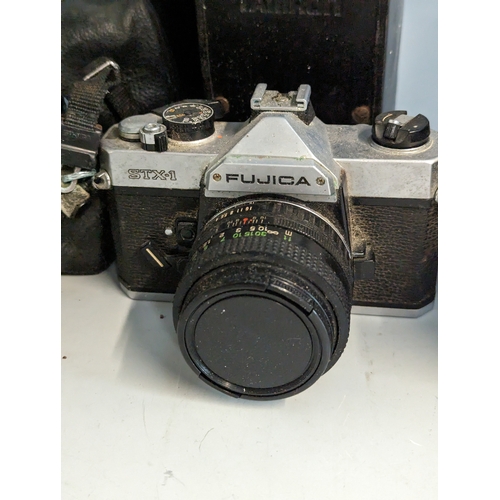 170 - Olympus om10, Fujica stx-1, Polaroid, Retina, Casio LCD TV portable, Elmo super zoom converter, vide... 