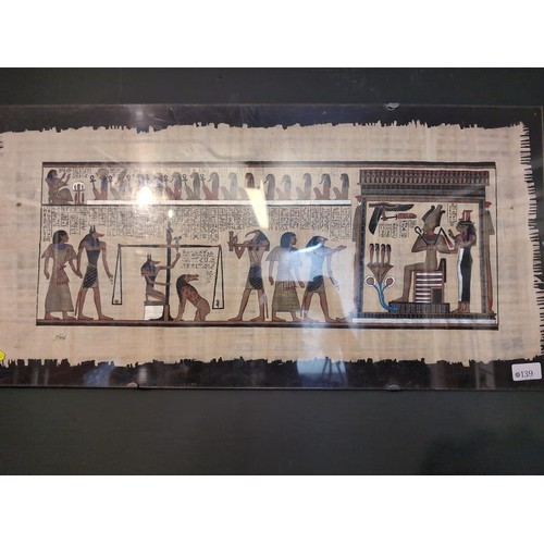 139 - Two Egyptian paintings on papyrus in clip frames, landscape painting 76 x 38cm