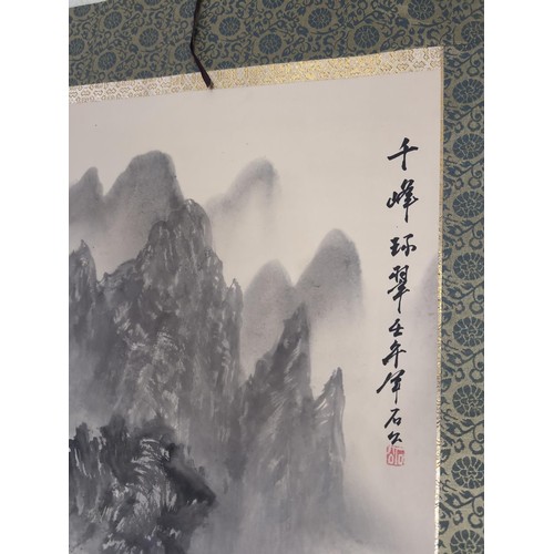 168 - 2 Chinese scrolls, a landscape on silk, 67 x 207 cms, with blue & white ceramic weighted end plu... 