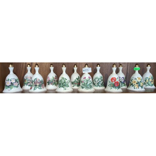 175 - Set of 12 Danbury Mint 'Summer Collection' china bells, ht approx 12.5 cms