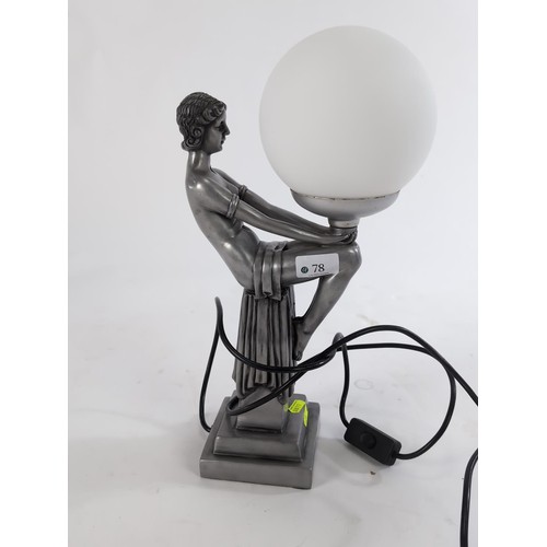 78 - Metal lamp of figurative lady holding globe. H41cm