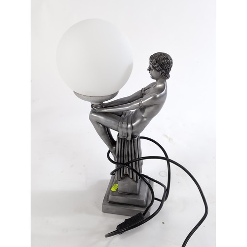 78 - Metal lamp of figurative lady holding globe. H41cm