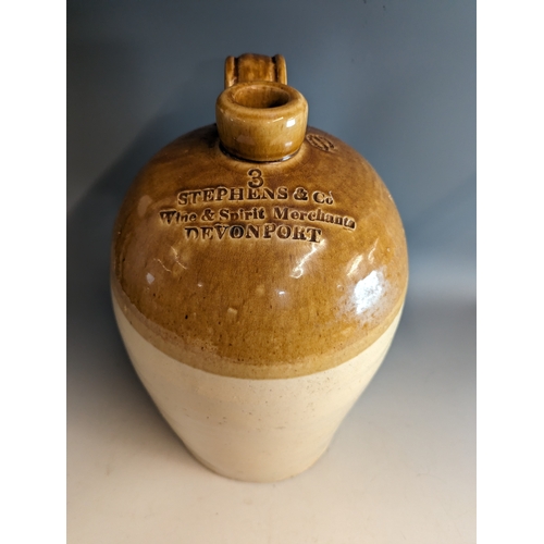 202 - Stoneware flagon marked 