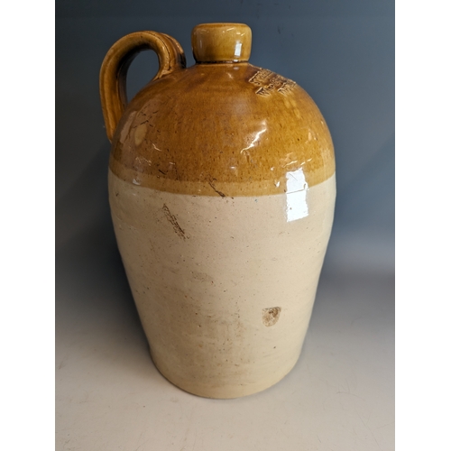 202 - Stoneware flagon marked 