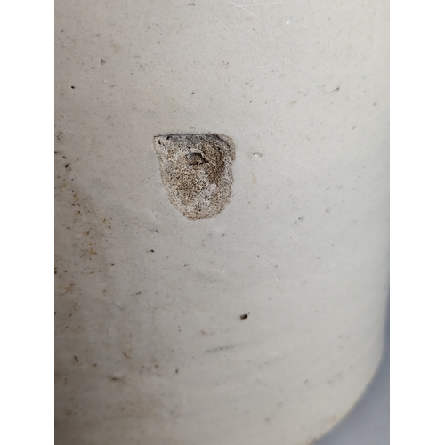 202 - Stoneware flagon marked 