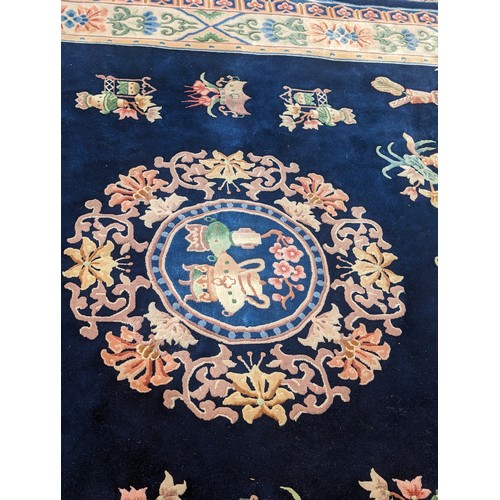 557 - Chinese royal blue rug, 3.7m by 2.76m approx