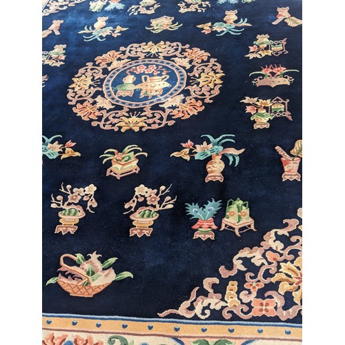 557 - Chinese royal blue rug, 3.7m by 2.76m approx