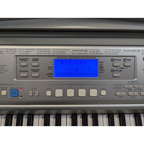 563 - Casio CTK-810 keyboard on stand.