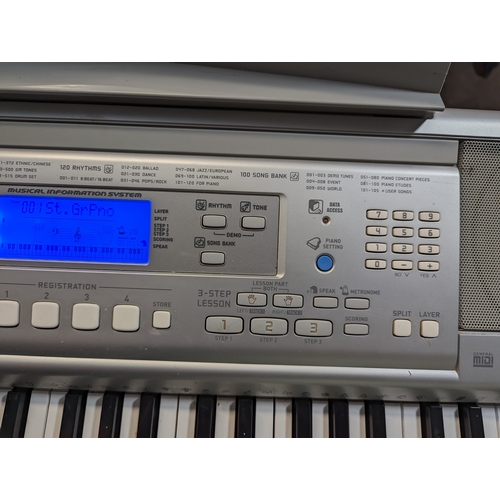 563 - Casio CTK-810 keyboard on stand.