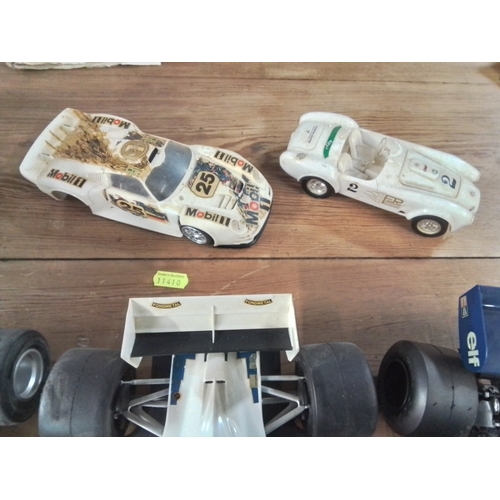 573 - 4 x Large plastic model F1 cars + 2 other plastic models AF