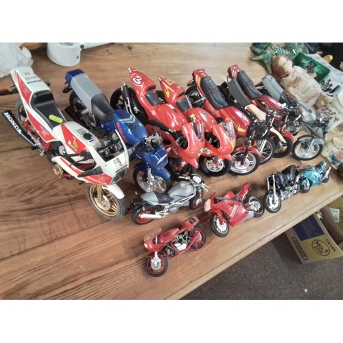 574 - Large collection of large model motorcycles inc Honda, yamaha, education etc.. AF