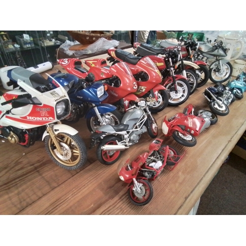 574 - Large collection of large model motorcycles inc Honda, yamaha, education etc.. AF