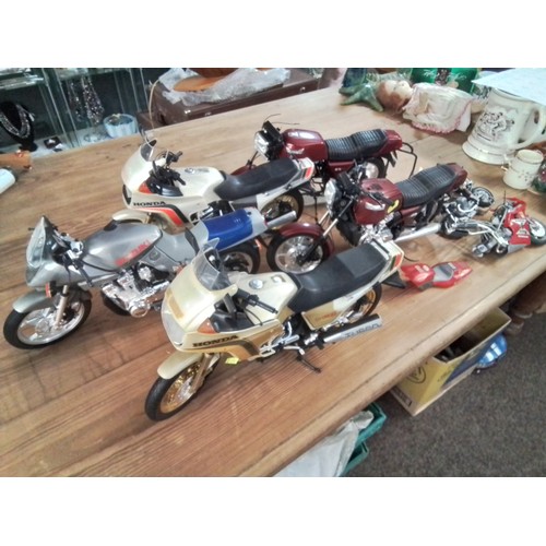 574 - Large collection of large model motorcycles inc Honda, yamaha, education etc.. AF