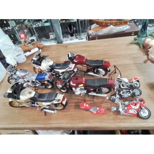 574 - Large collection of large model motorcycles inc Honda, yamaha, education etc.. AF