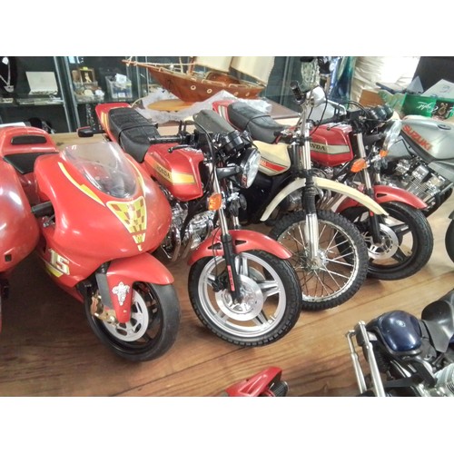 574 - Large collection of large model motorcycles inc Honda, yamaha, education etc.. AF