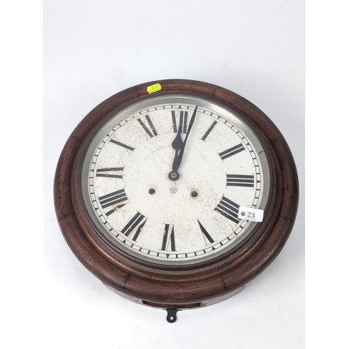 23 - Mahogany cased wall clock. D41cm