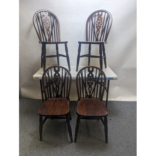 47 - 4 x Wheelback dining chairs