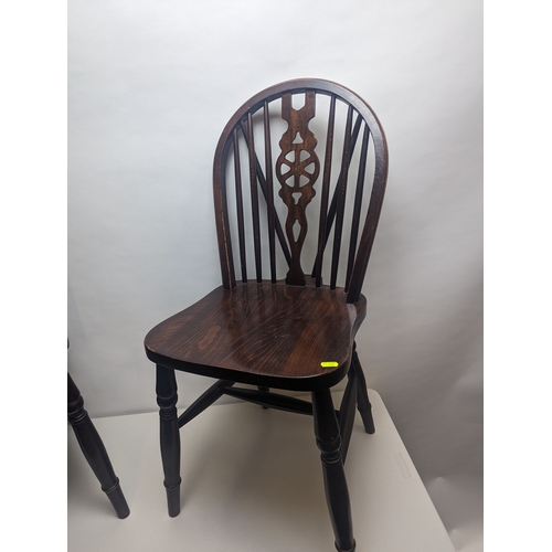 47 - 4 x Wheelback dining chairs