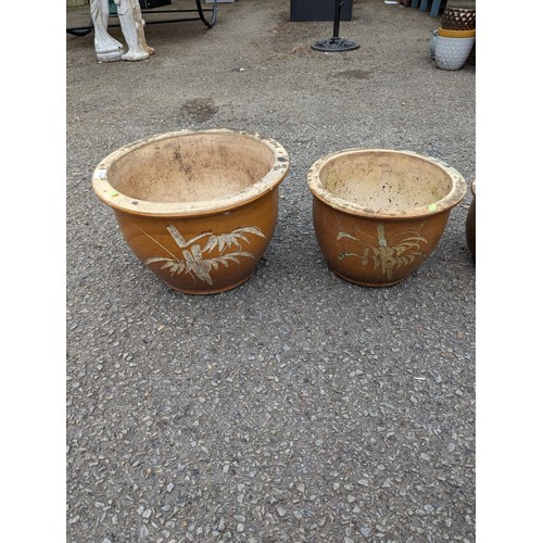 14 - Four graduated glazed planters, largest dia. 39 x ht.26cm