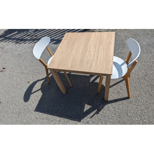 199 - John Lewis table and 2 chairs. Table dimensions 80cm by 80cm 73 cm approx