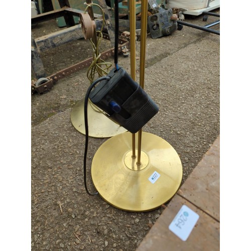 113 - Two brass effect standard /reading lamps