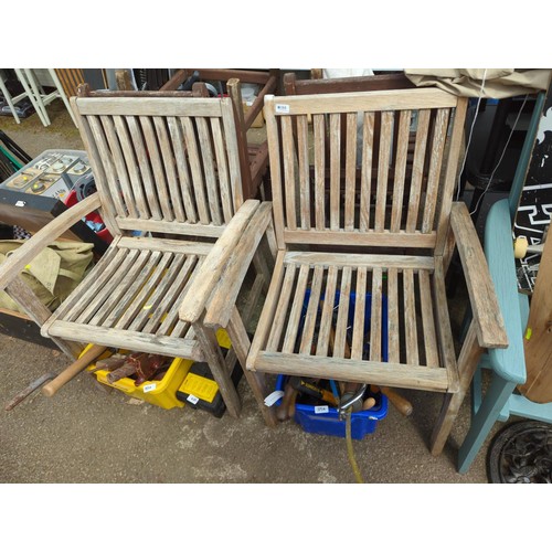 188 - Pair of teak garden seats