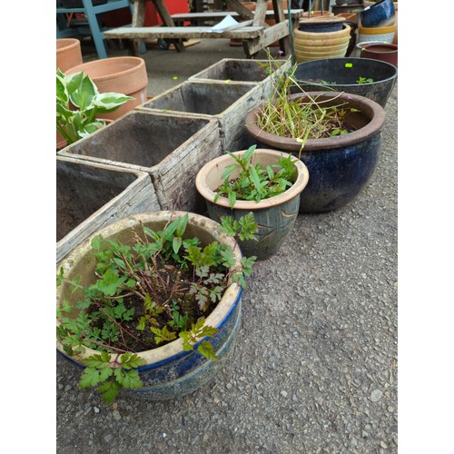 206 - 3 glazed plant pots & 1 composite material pot. Largest diameter 38cm