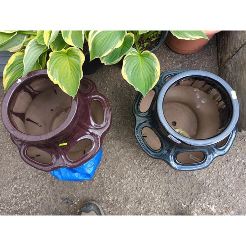 208 - Two glazed strawberry planters Ht. 33cm